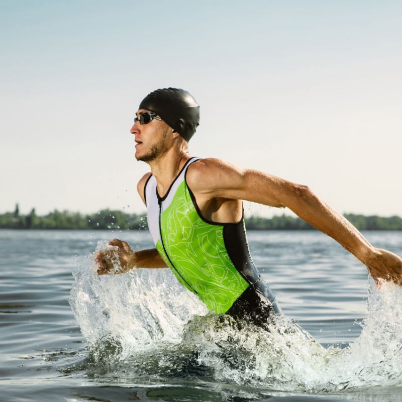 athlete running by the ocean